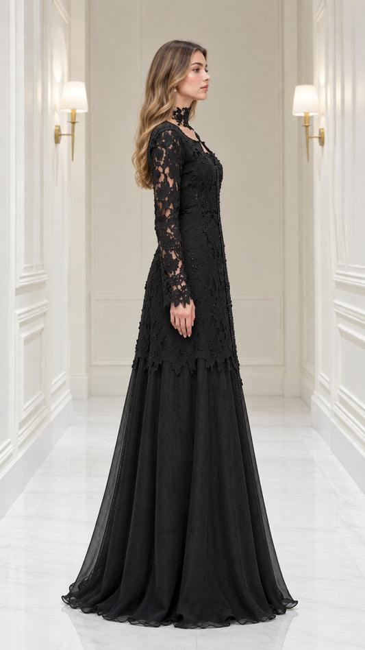 Side angle of elegant black lace evening gown with flowing chiffon skirt