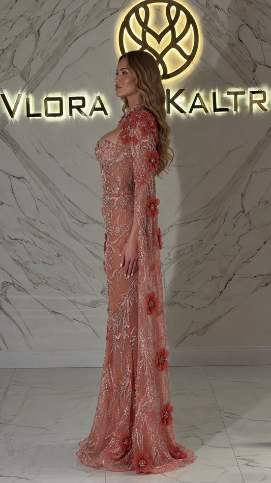 Side profile of Dusty Rose beaded cape sleeve formal gown showing fitted silhouette