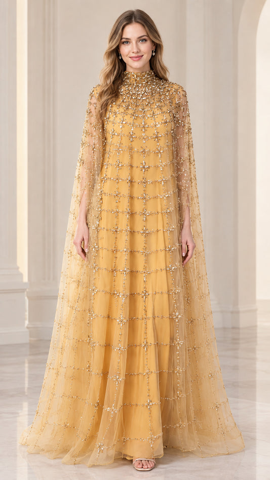 Front full view of woman wearing gold high-neck beaded cape evening gown