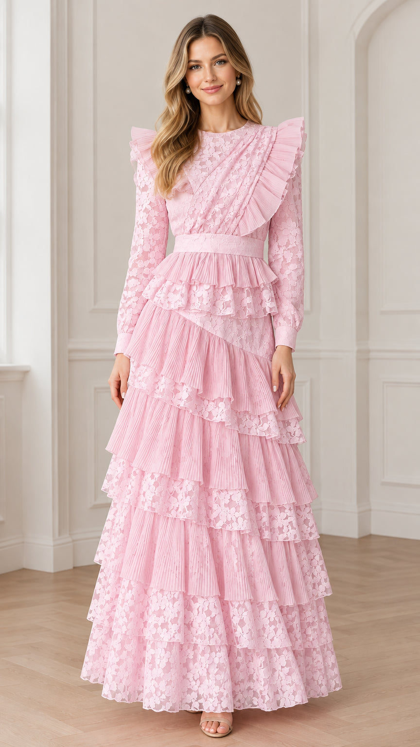 Model wearing long sleeve pastel pink tiered floral lace maxi dress front view