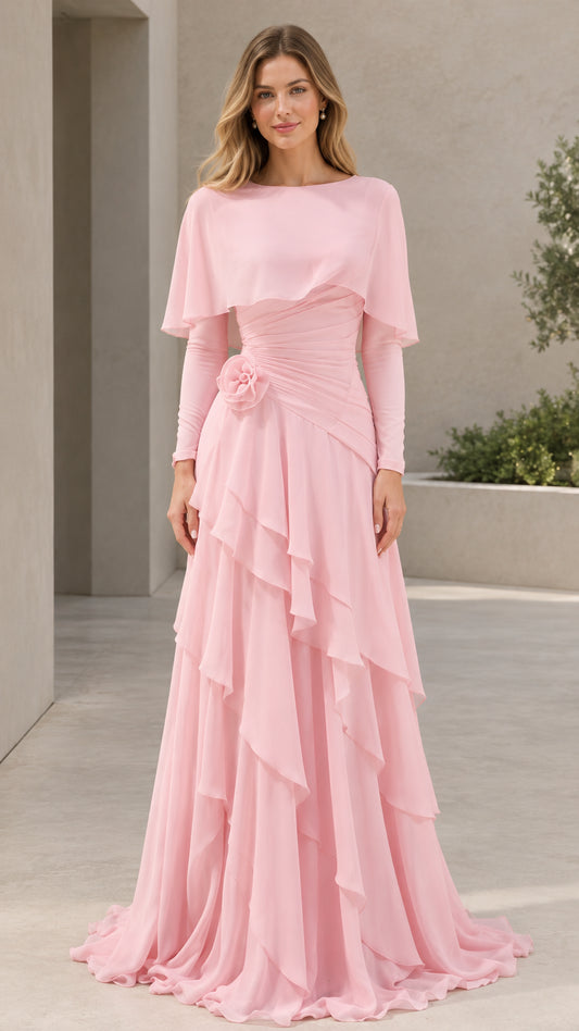 Front view of woman wearing Light Pink capelet tiered ruffle evening gown with long sleeves