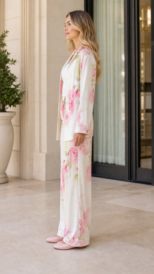 Side profile view of ivory floral print loungewear set with wide leg pants