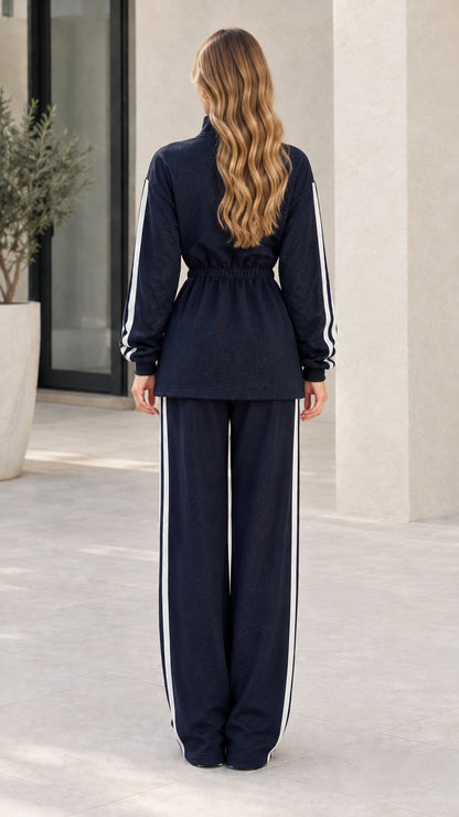Back view of navy blue two-piece wide leg tracksuit set