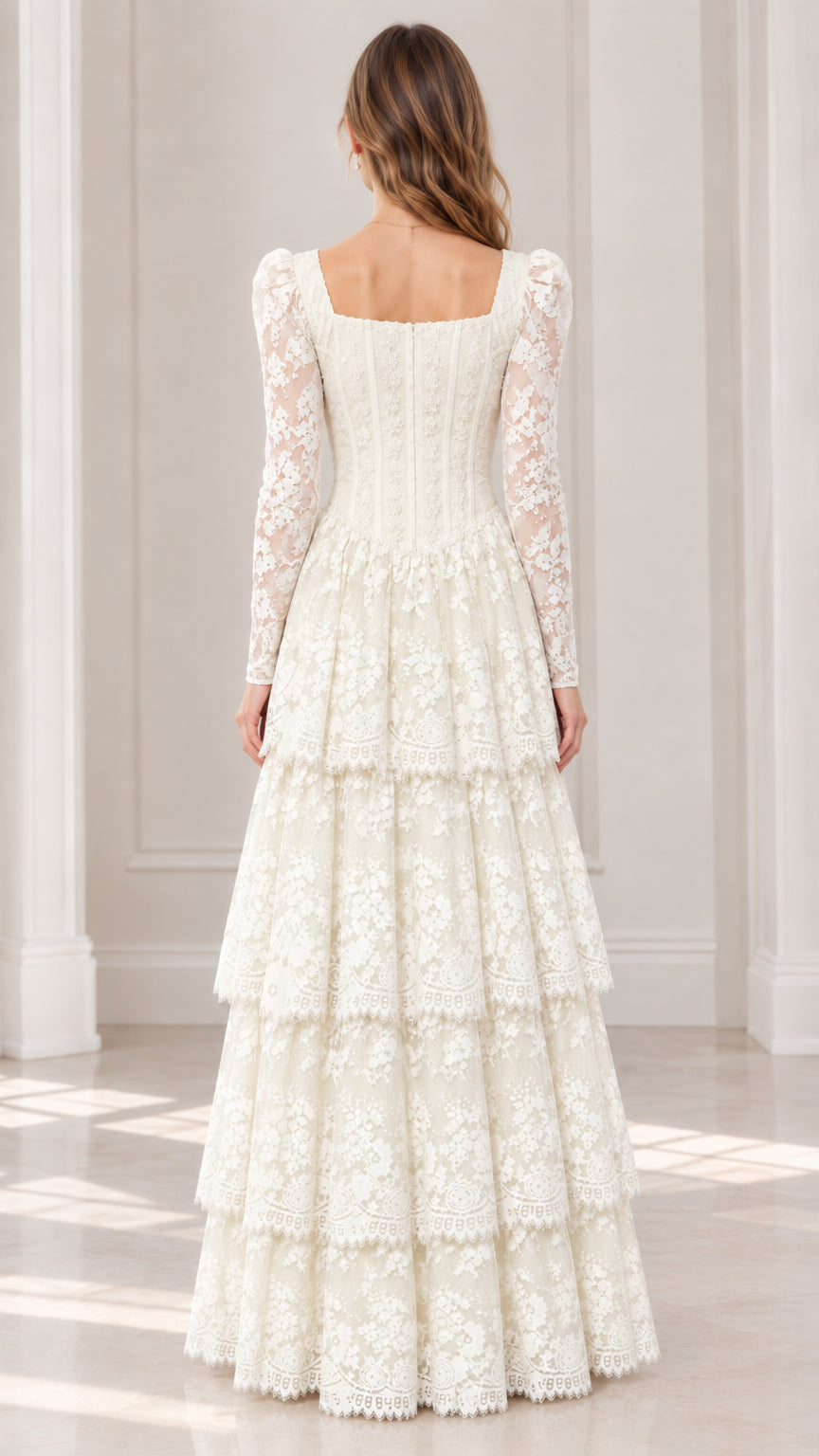 Back view of model wearing ivory long sleeve tiered lace maxi dress