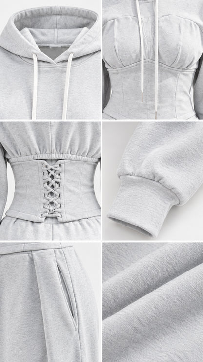 Close-up details of hood drawstrings, corset seams, lace-up back, cuff, and pocket