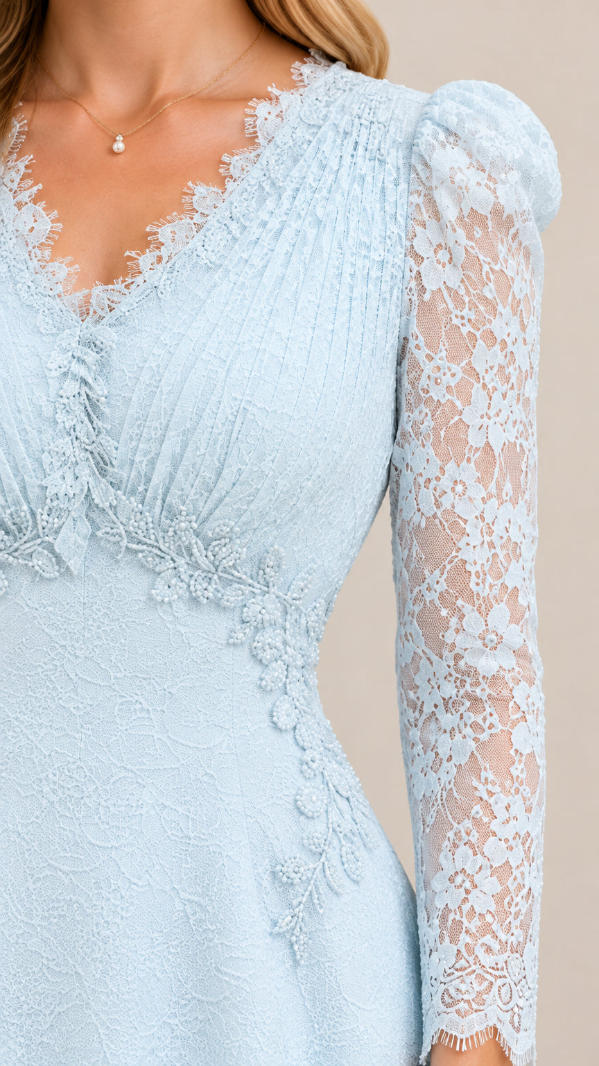 Close-up of Light Blue scalloped lace V-neck bodice and sheer sleeve