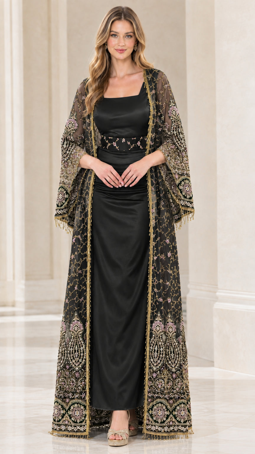 Front view of black embroidered duster cape and matching black satin maxi dress