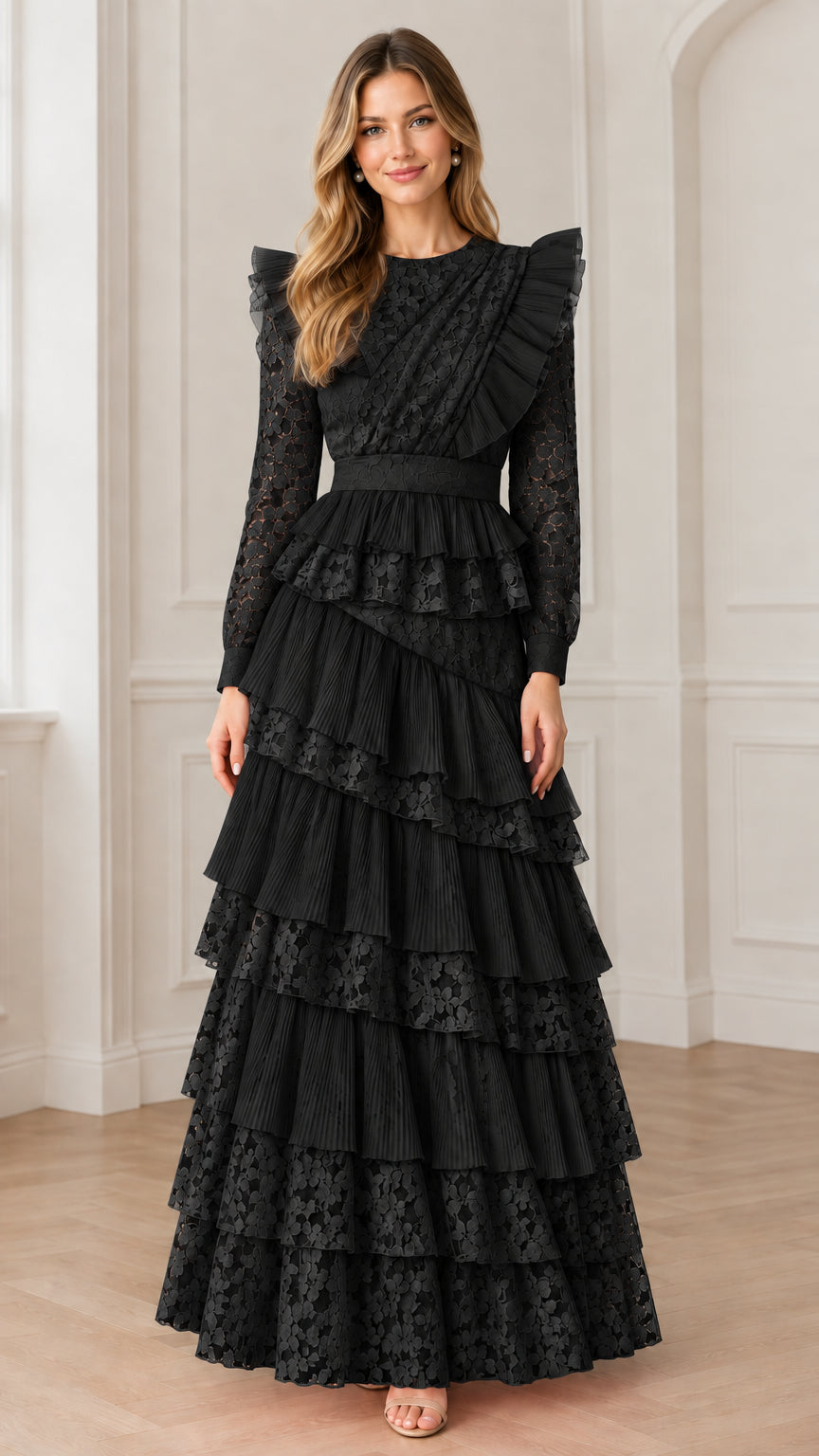 Model posing in black long sleeve tiered ruffle lace formal maxi dress