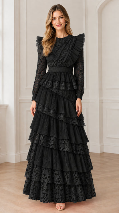 Model posing in black long sleeve tiered ruffle lace formal maxi dress