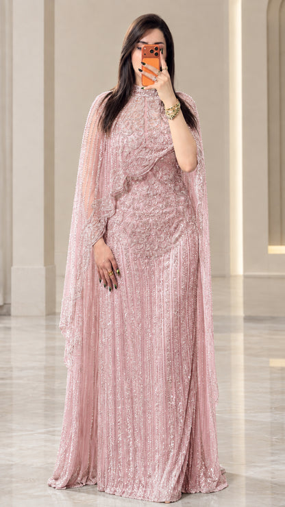 Full-length view of dusty pink sequined cape formal evening maxi dress