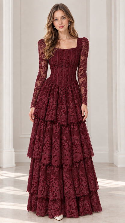 Front view of model wearing burgundy long sleeve tiered lace maxi dress