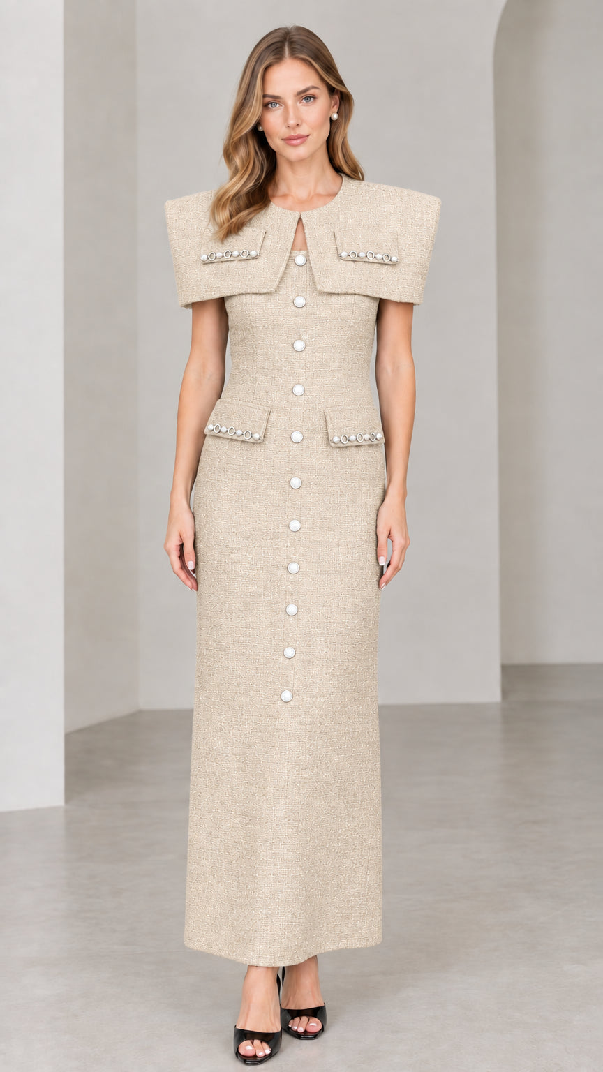 Front view of beige cream capelet tweed maxi dress with pearl accents