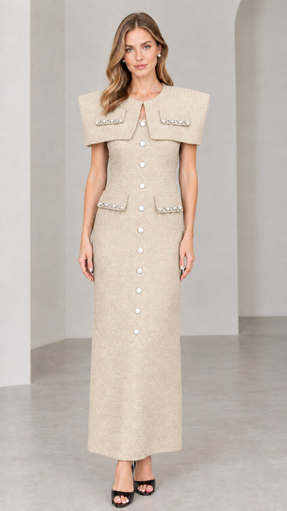 Front view of beige cream capelet tweed maxi dress with pearl accents
